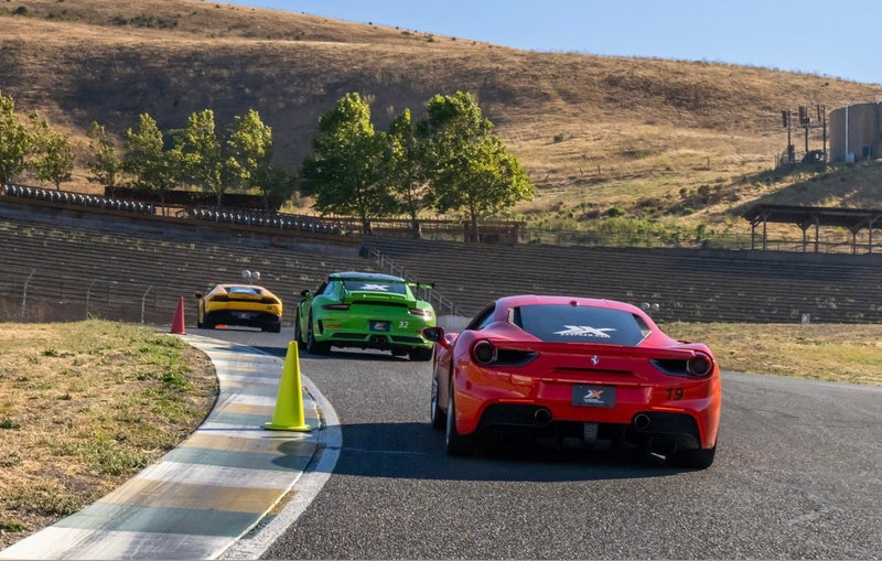 3 cars on a track