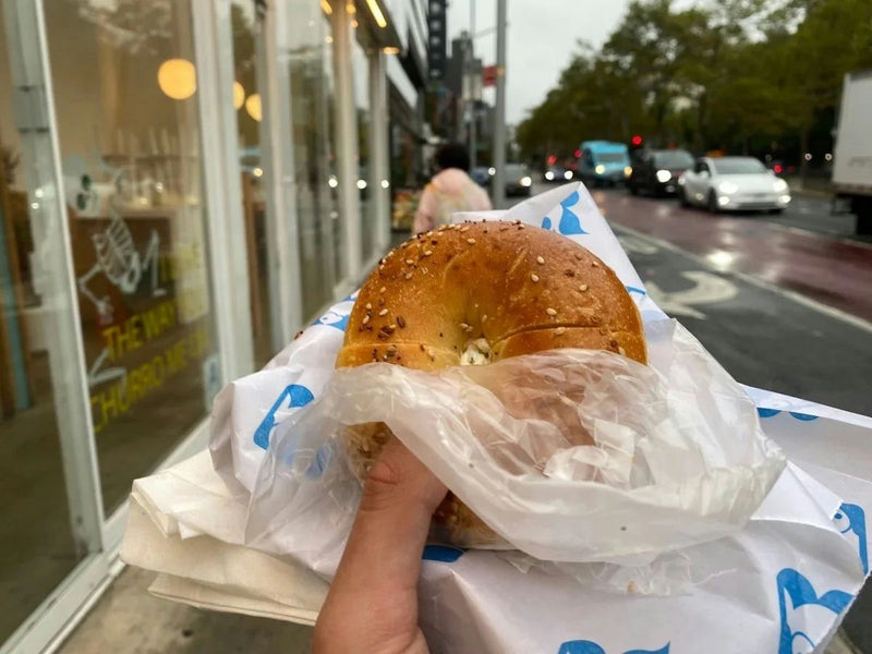 holding bagel