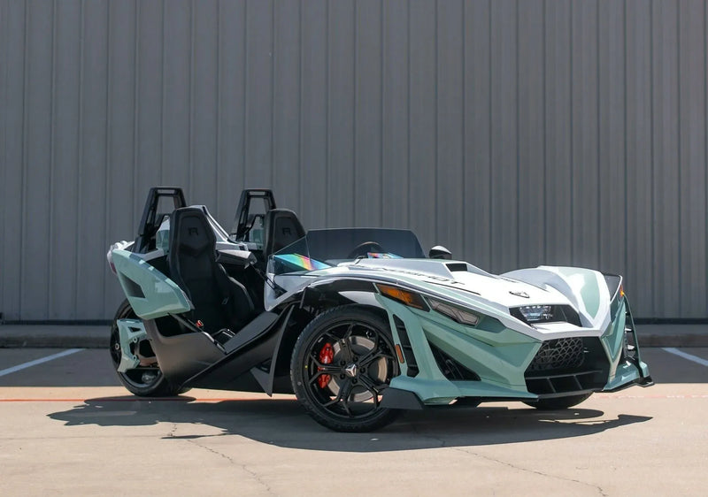 4-hour-polaris-slingshot-rental-houston-mint-green-dual-seats-open-doors.webp
