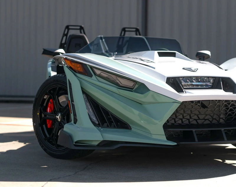 8-hour-polaris-slingshot-rental-houston-mint-green-front-grille-closeup.webp