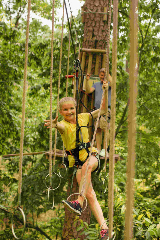 Happy girl on ropes course