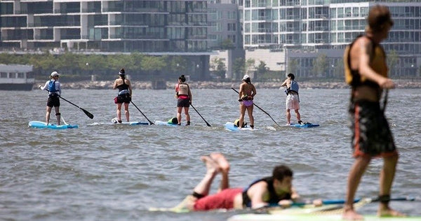 group of women on paddleboard