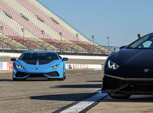 Two Lambos on track