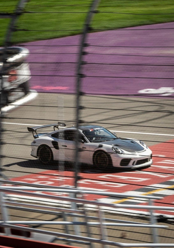 White Porsche on Track