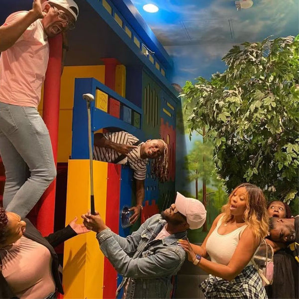 A person pops up out of the playground escape