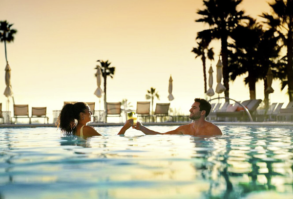 Aarna - Pool Couples wiyh bubbly.png