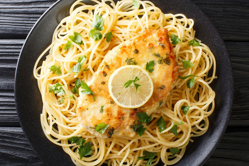 Angel Hair Pasta on plate with lemon.jpg