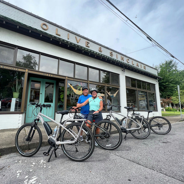 bikers with mural.jpeg