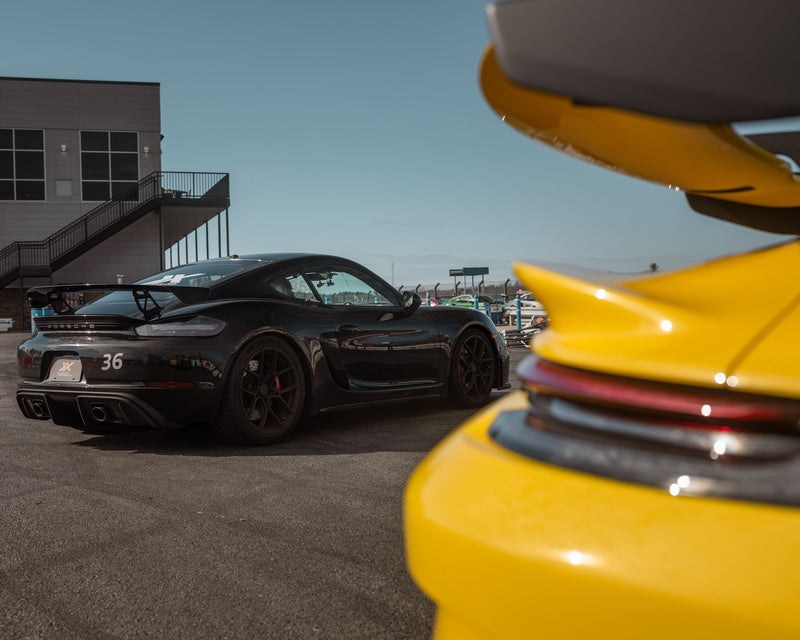 black-porsche-from-a-distance