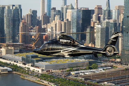 black helicopter flying passed new york city