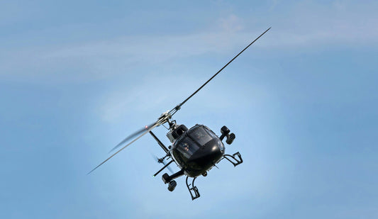 black helicopter in sky