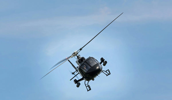 black helicopter in sky