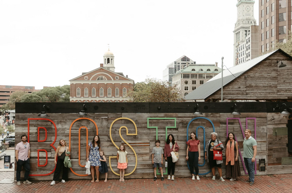 Boston Food Tour group with sign.png