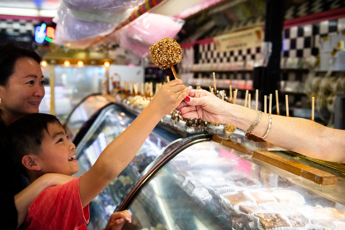 boy-getting-a-candy-apple
