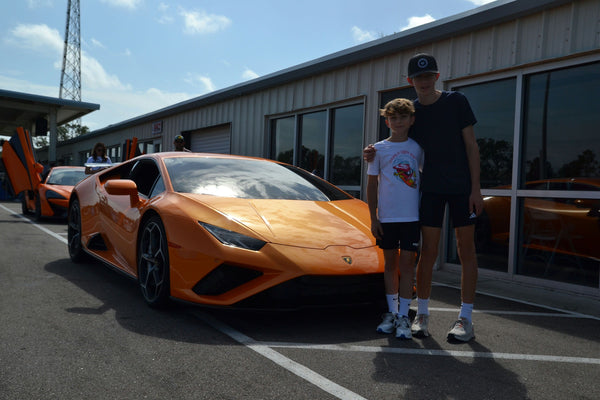 boys with sports car in florida