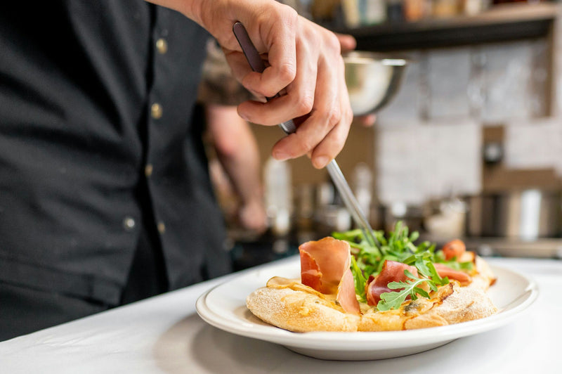 Chef with plate of food 20.jpg
