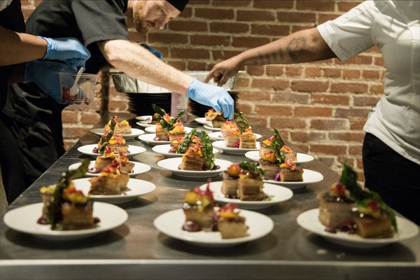 chefs plating food