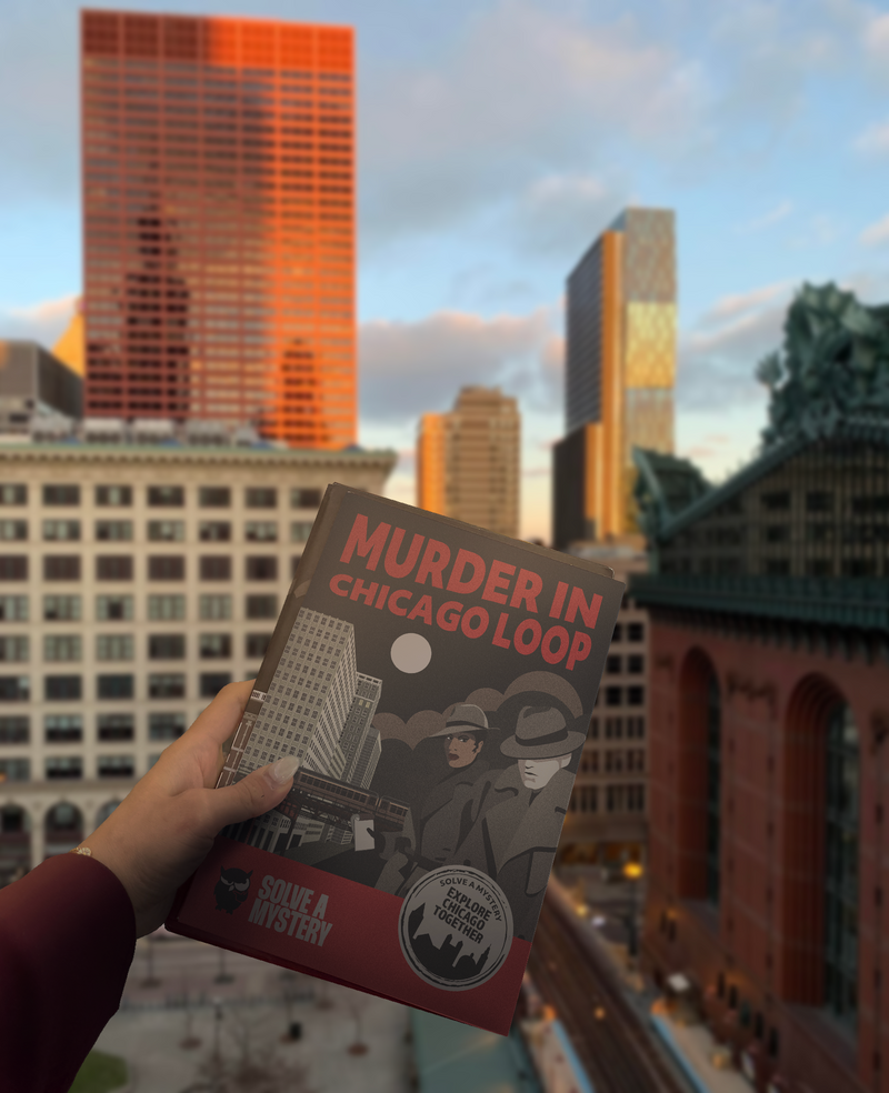 chicago pic_hand holding booklet.png