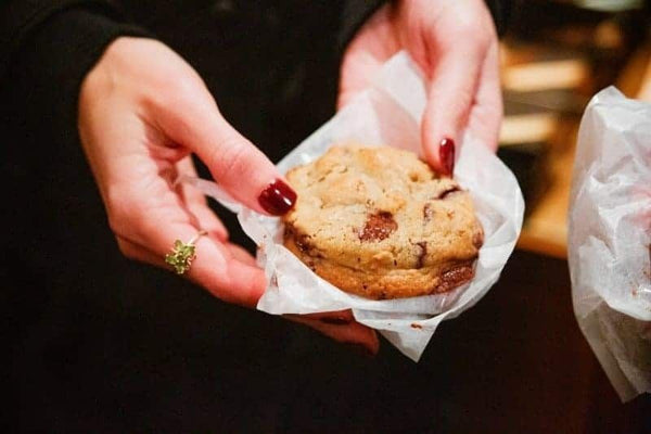 chocolate-chip-cookie-in-hand