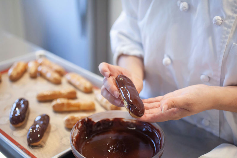 Chocolate Éclairs dipping.jpg