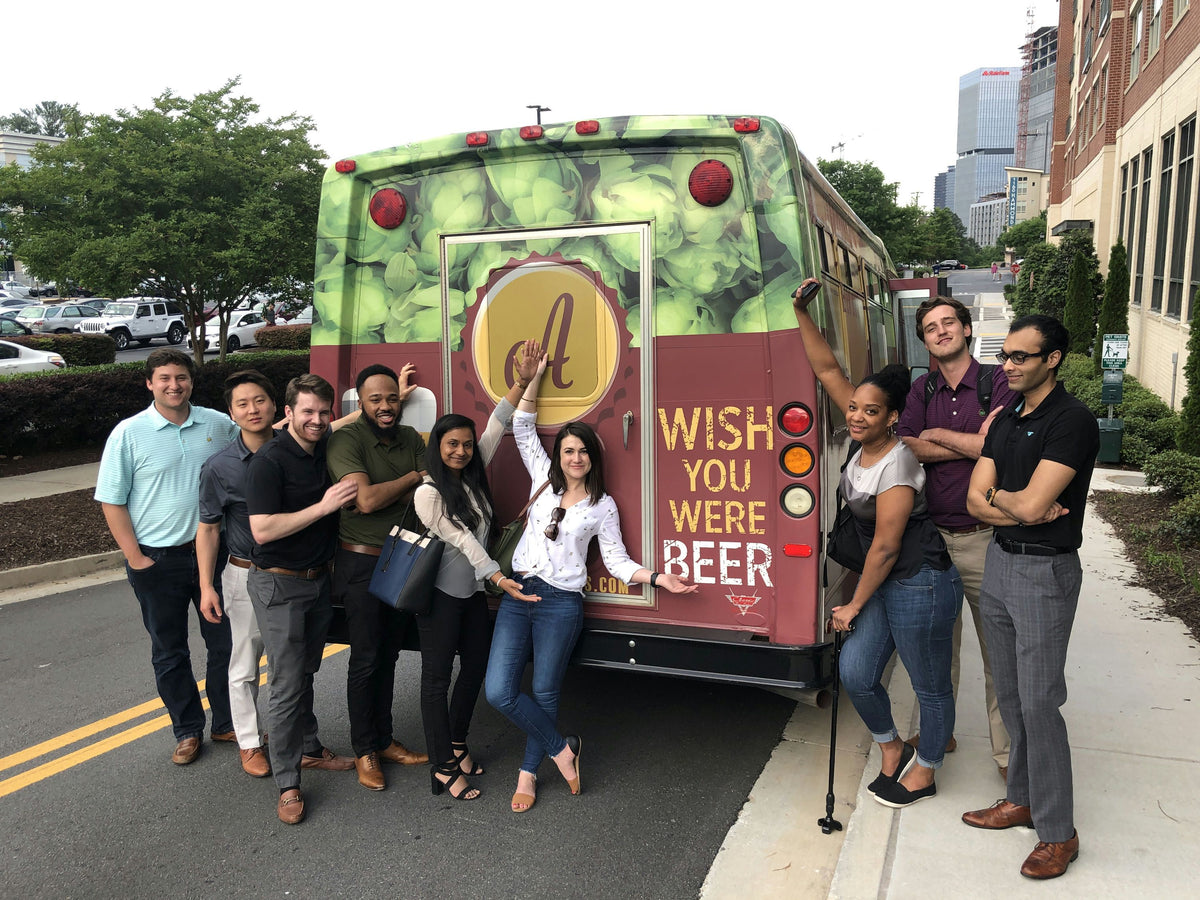 co-ed-group-outside-of-bus