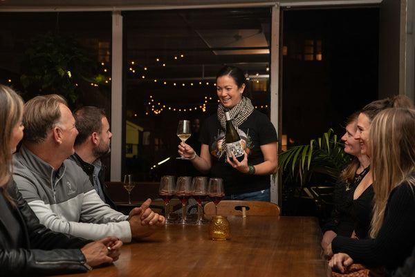 full table of wine and snacks