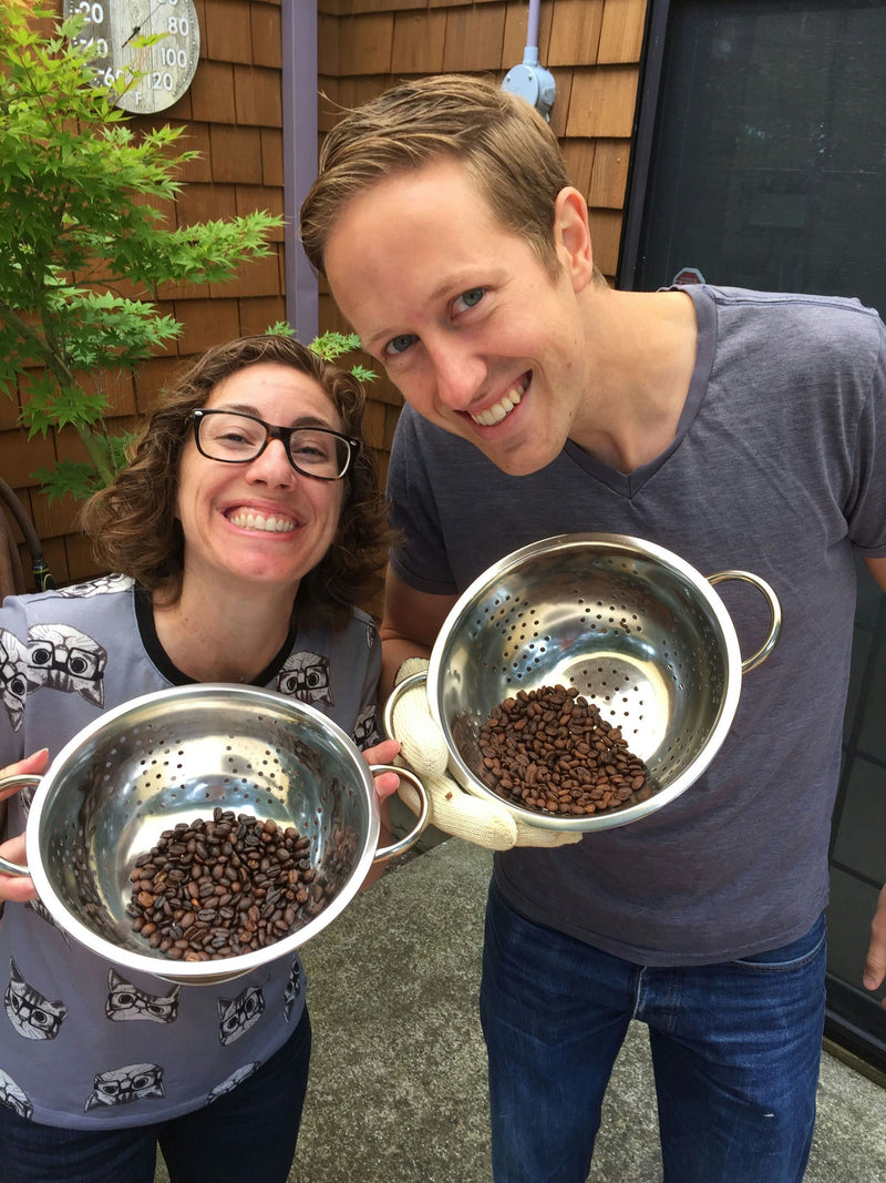 Couple with coffee beans.JPG