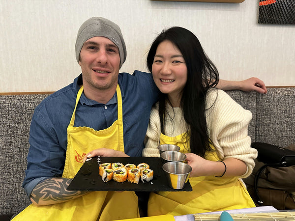 Sushi roll and chopsticks