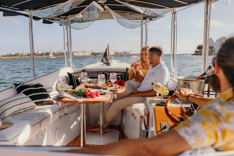 couple-cheersing-on-boat