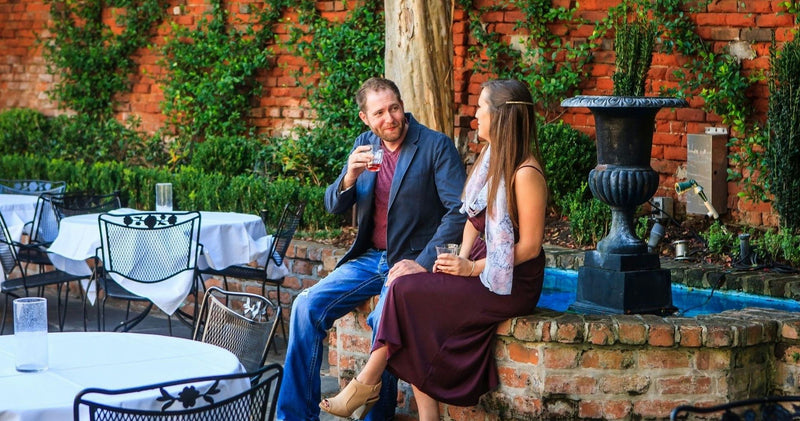 couple drinking by fountain.jpg