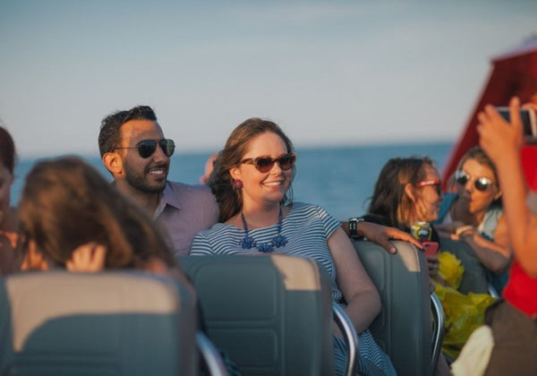 couple-enjoying-lake-front-speed-boat-tour