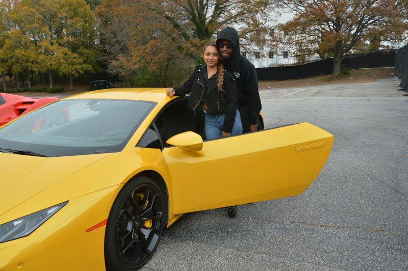 couple in yellow car