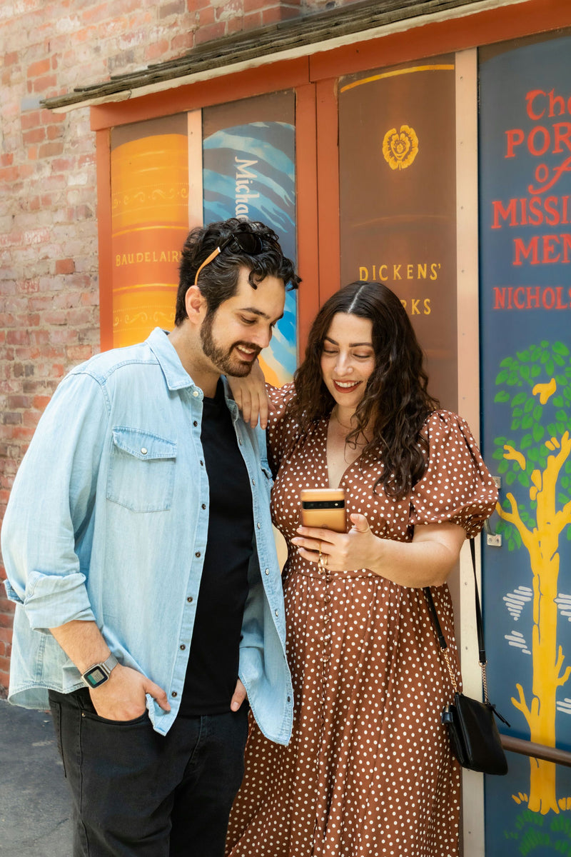 couple looking at phone