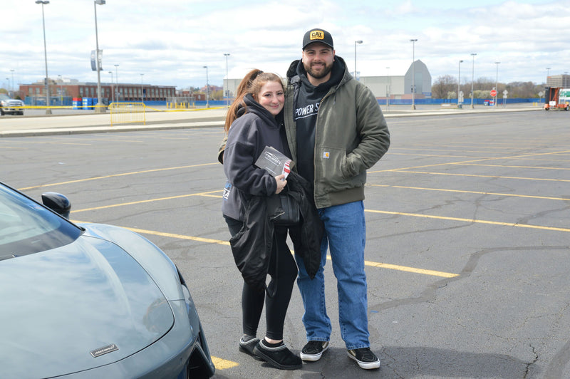 couple with cool car