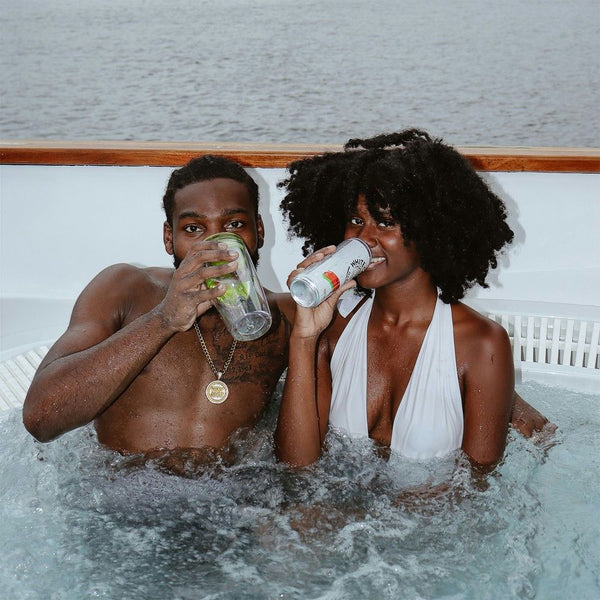 couple-with-drinks-in-hot-tub