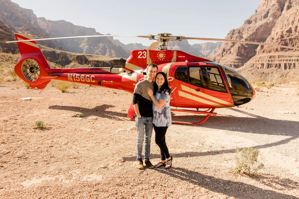 couple-with-helicopter-in-canyon