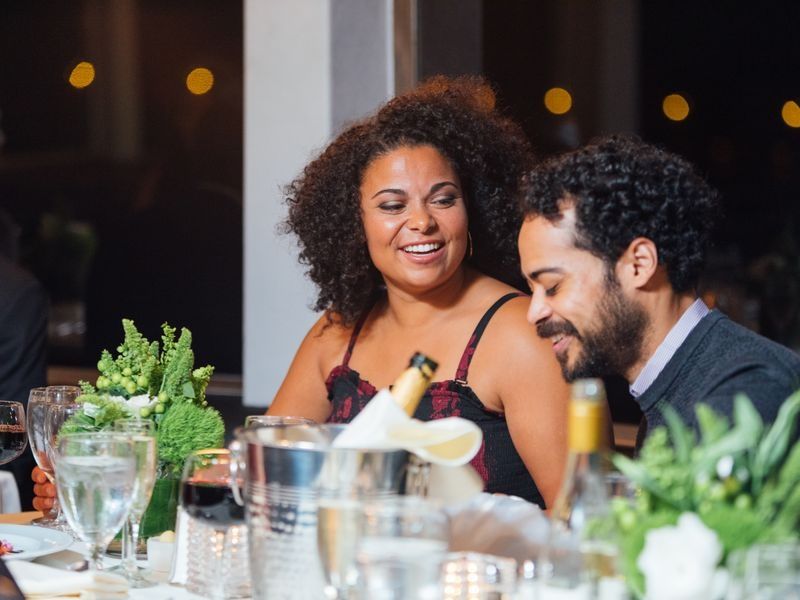 coupling-enjoying-dinner-on-a-dinner-cruise