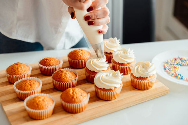 cupcakes getting frosted