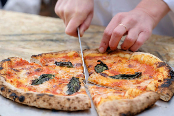 cutting pizza