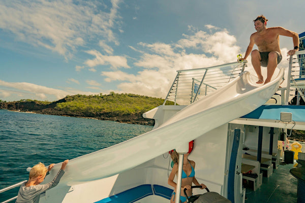 Deluxe Snorkel & Dolphin Watch sliding into water.jpg