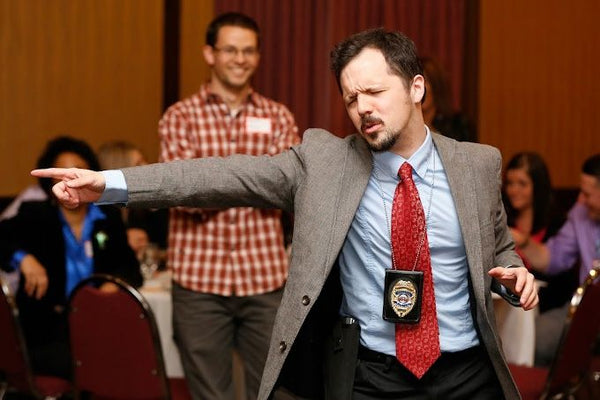 detective pointing out killer