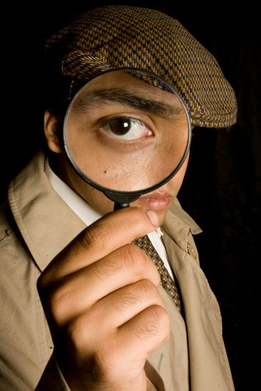 detective magnifying the case