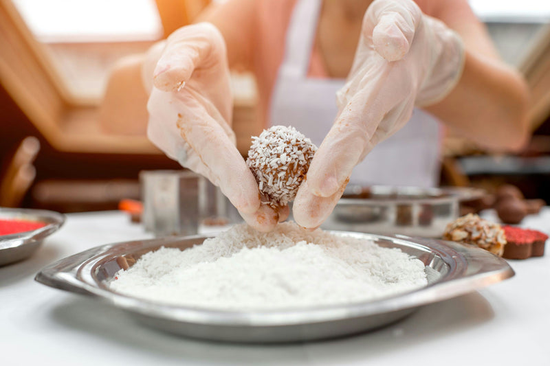 Dipping Coco in Coconut