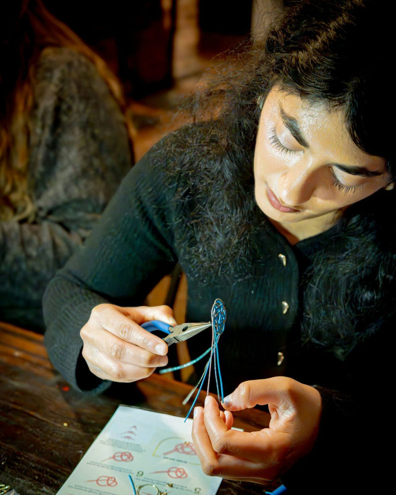 Woman making knots