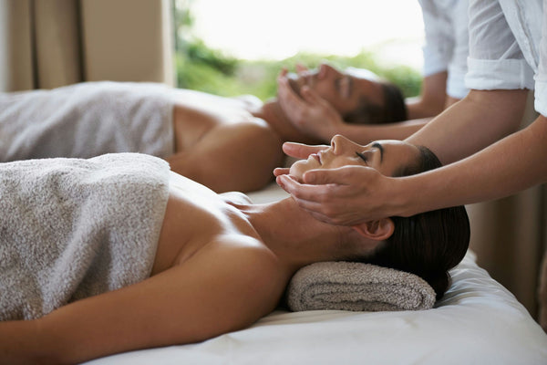 facial massage on couple