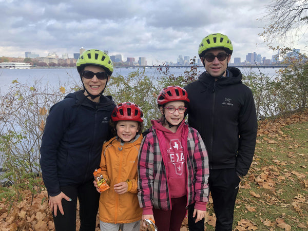 father and daughter on bikes