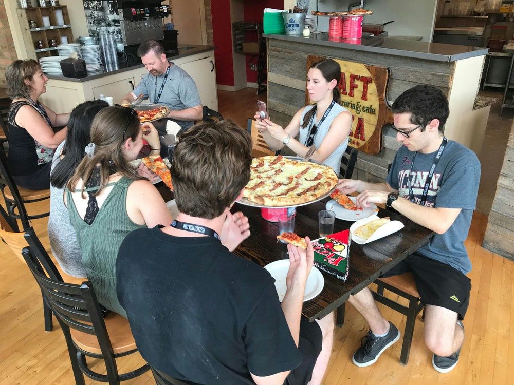 family-eating-pizza-dinner