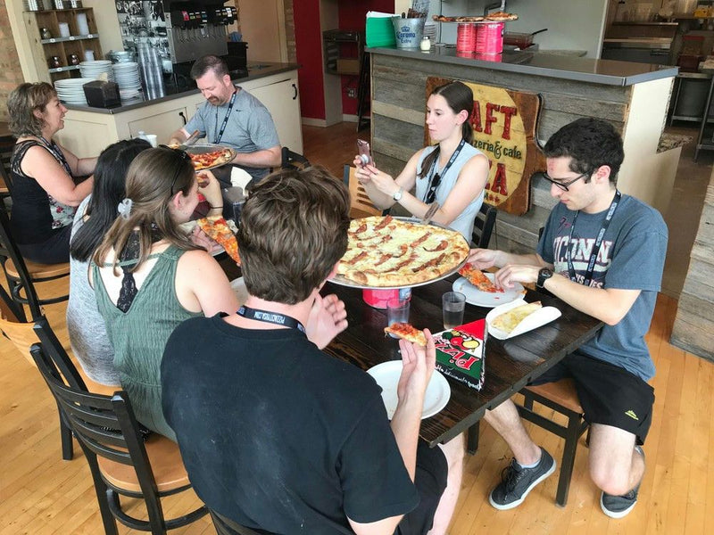 family-eating-pizza-dinner