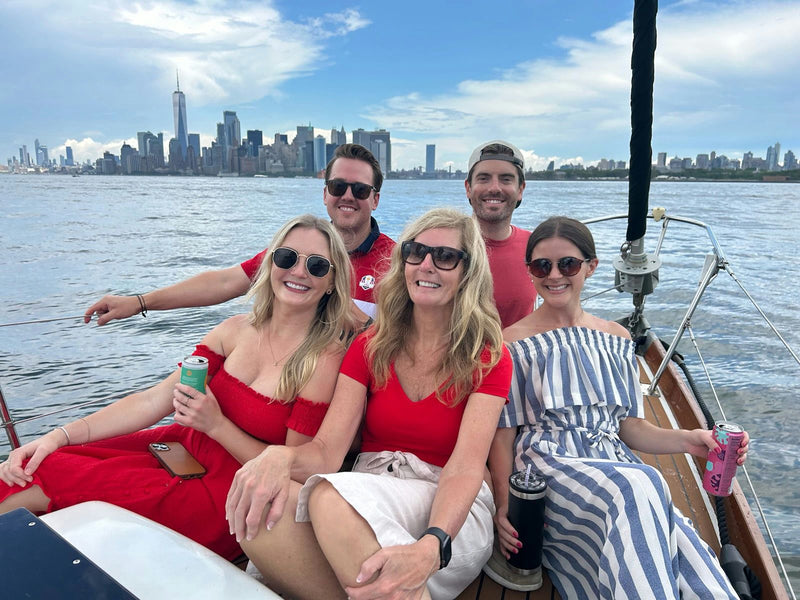 family on sail boat