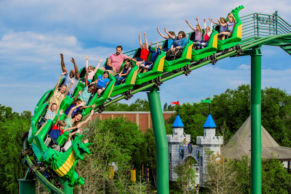 family-riding-roller-coaster-jpg